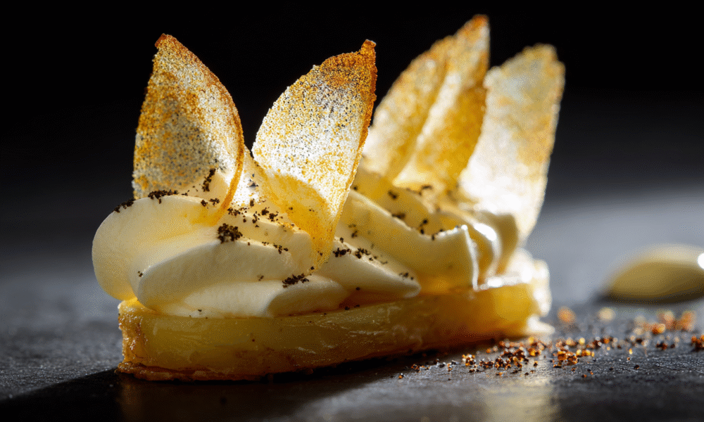 shukster_A_haute_cuisine_garnish_presented_on_matte_white_slate_cbf81eda-210f-41eb-a5ff-4e2aefb012a7